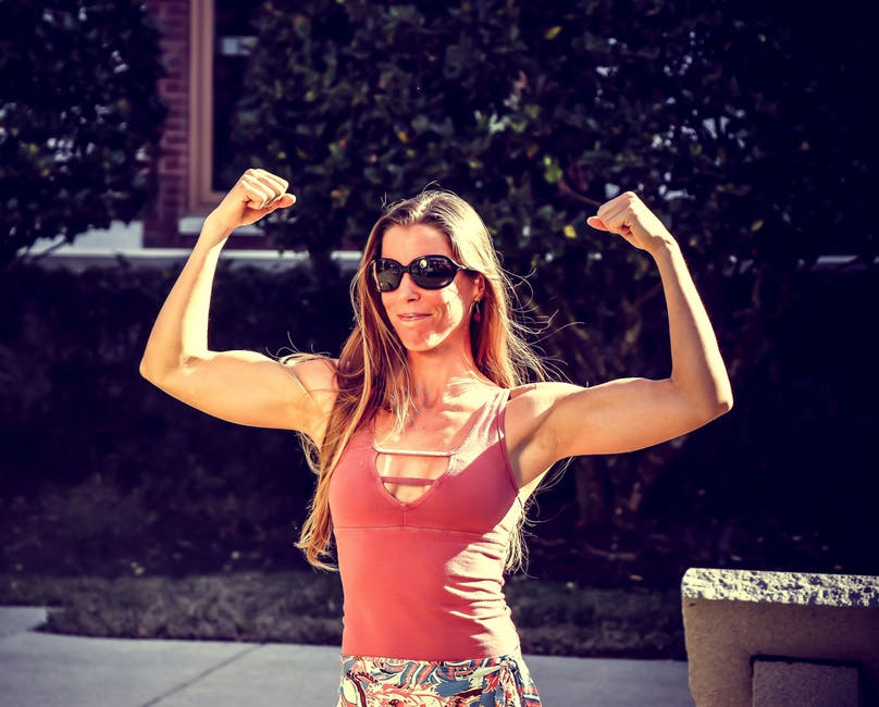 woman showing her muscles